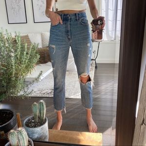 Distressed denim jeans